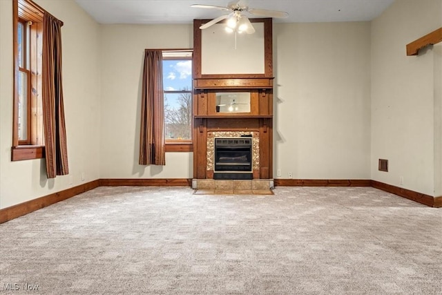 117 Franklin St, Marietta, OH 45750 - unfurnished living room featuring carpet, a ceiling fan, a tile fireplace, and heating unit