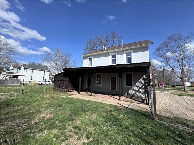 117 Franklin St, Marietta, OH 45750 - back of property featuring a patio area and stucco siding