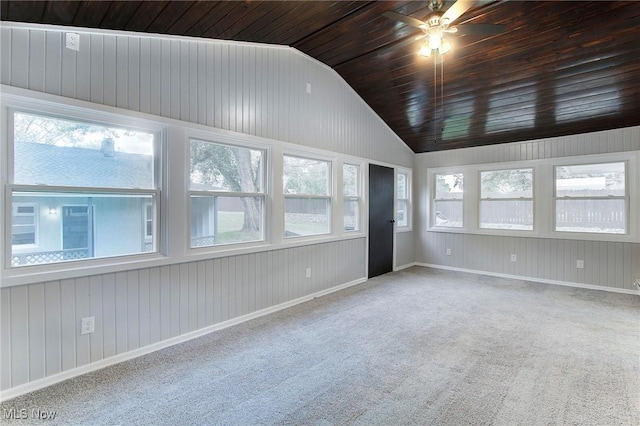 unfurnished room featuring carpet floors, wood ceiling, vaulted ceiling, and ceiling fan