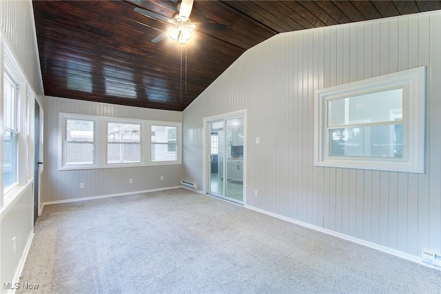 carpeted spare room featuring ceiling fan, a baseboard radiator, lofted ceiling, and wooden ceiling