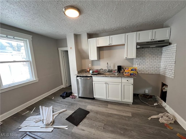 kitchen featuring stainless steel dishwasher, dark hardwood / wood-style flooring, sink, and white cabinets