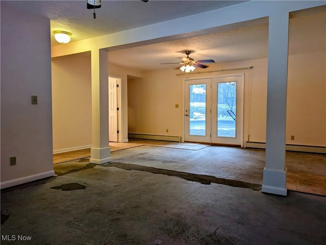 unfurnished room with baseboard heating, ceiling fan, and carpet flooring