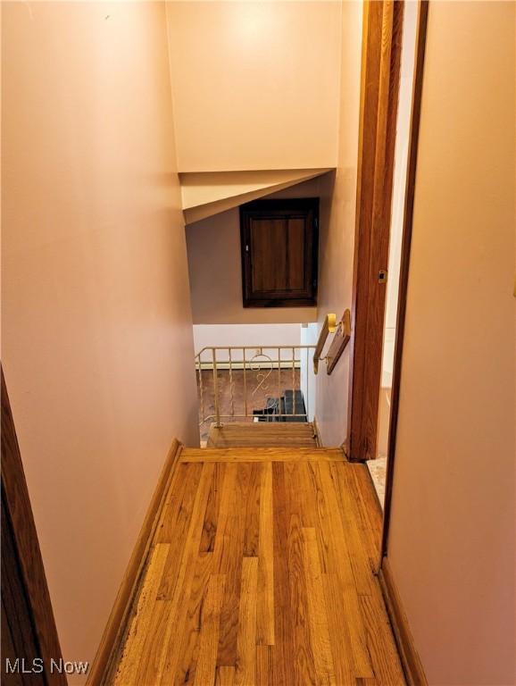 hallway featuring light wood-type flooring