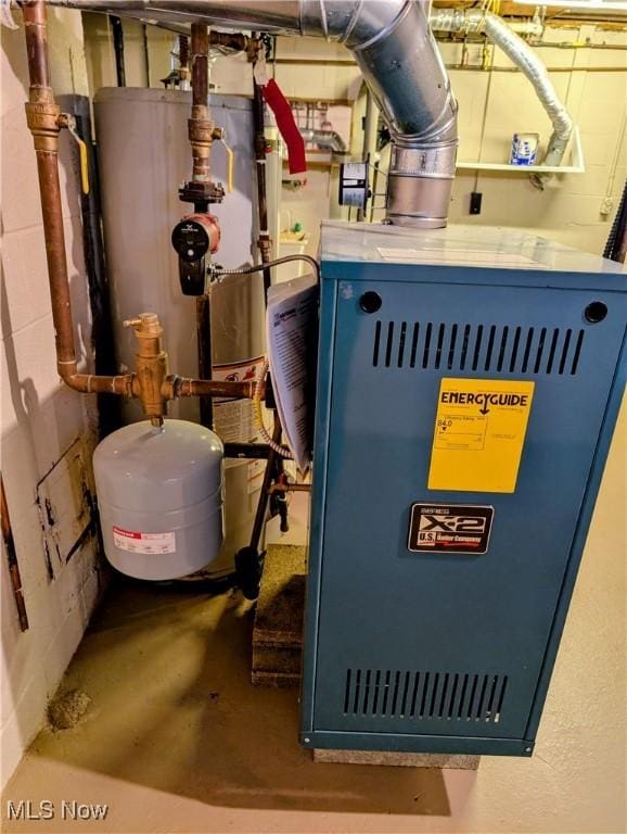 utility room with water heater