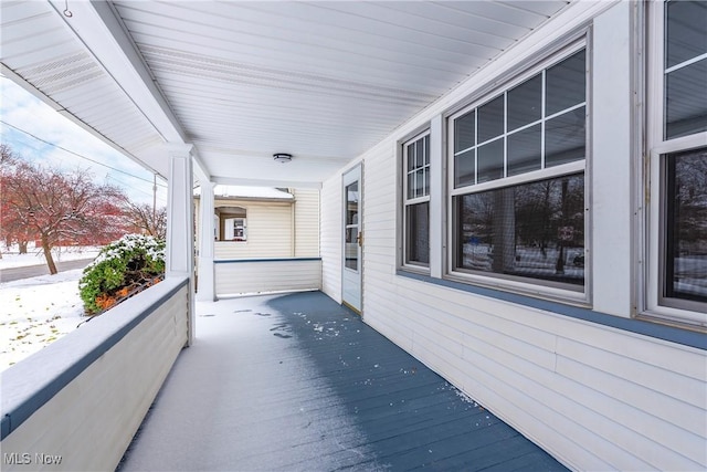 wooden terrace with covered porch