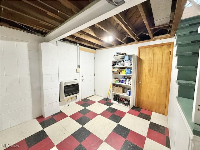 basement featuring heating unit