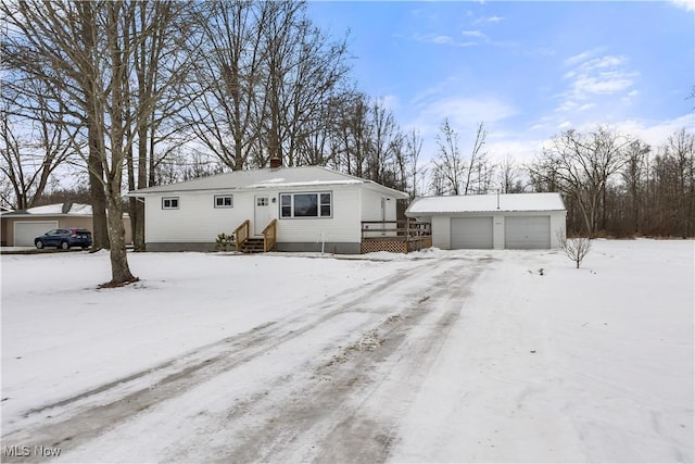 view of front of home with an outbuilding and a garage