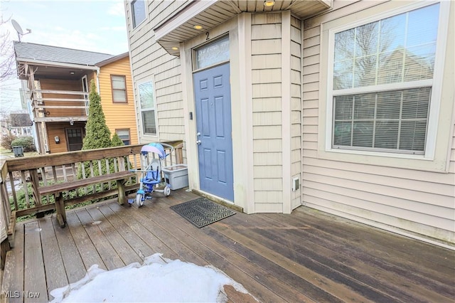 entrance to property with a wooden deck