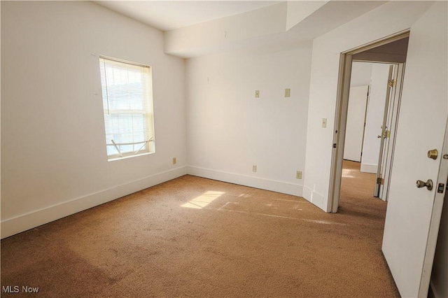 unfurnished room featuring carpet floors