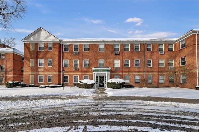 view of snow covered property