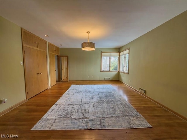 spare room featuring light hardwood / wood-style flooring