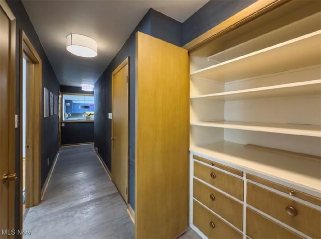 hallway featuring dark wood-type flooring