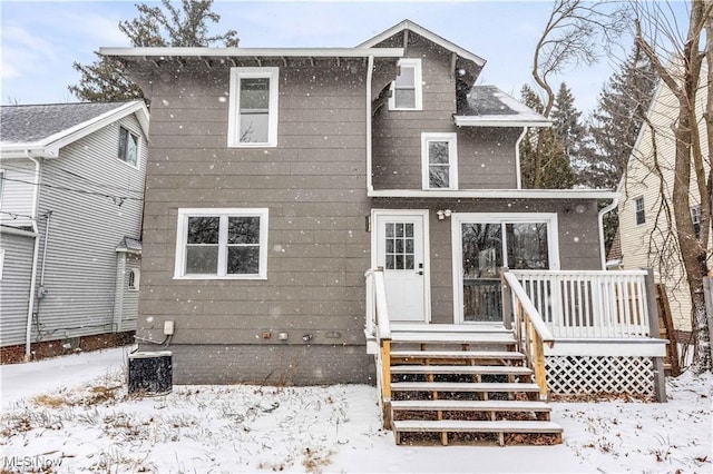 view of snow covered house