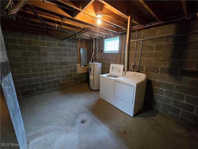 basement with separate washer and dryer, electric water heater, and electric panel