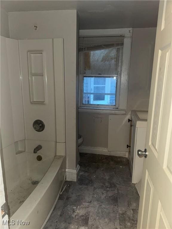 bathroom with shower / washtub combination