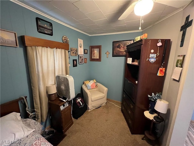 living area with light carpet and ornamental molding