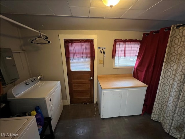 washroom featuring separate washer and dryer and electric panel