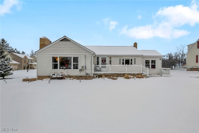 view of snow covered property