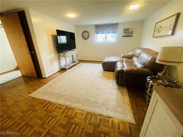 living room with dark parquet floors