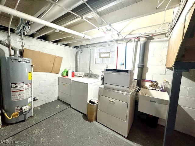 laundry area featuring independent washer and dryer and water heater