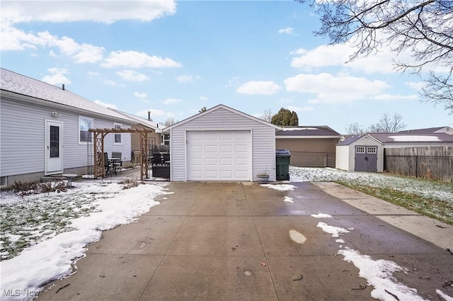 view of snow covered garage