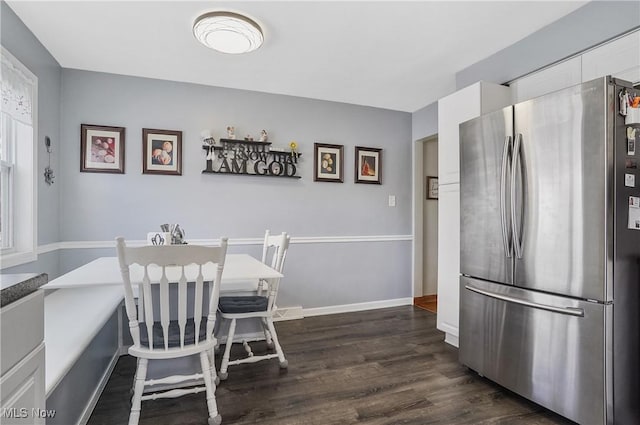 dining room featuring dark hardwood / wood-style flooring