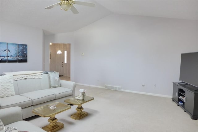 carpeted living room featuring lofted ceiling and ceiling fan