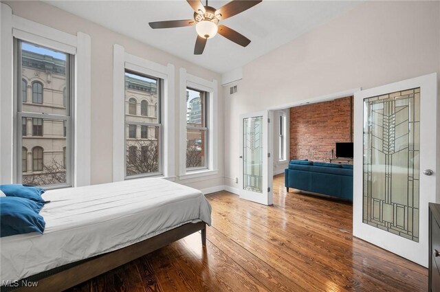 bedroom featuring ceiling fan and hardwood / wood-style floors