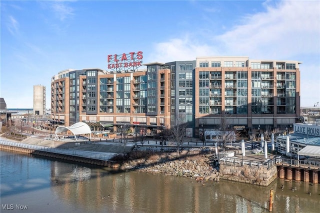 view of building exterior featuring a water view