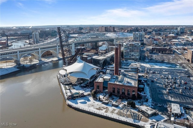 birds eye view of property with a water view and a city view