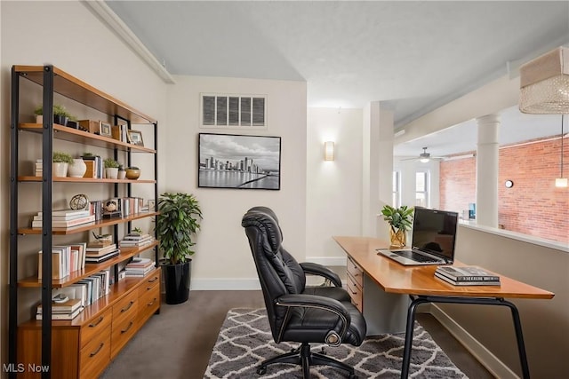 home office with carpet, baseboards, and visible vents