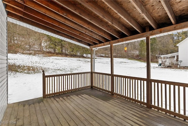 view of snow covered deck