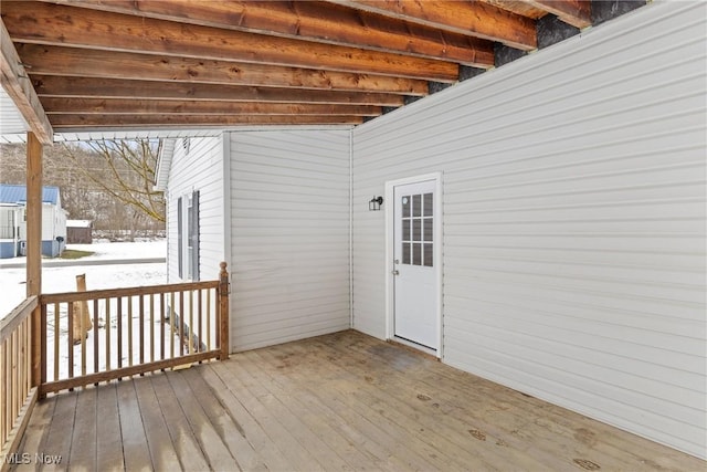 view of snow covered deck