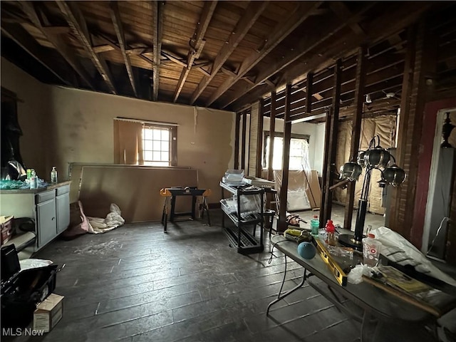 miscellaneous room with dark hardwood / wood-style floors