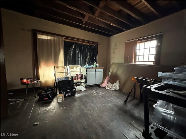 miscellaneous room with dark hardwood / wood-style floors