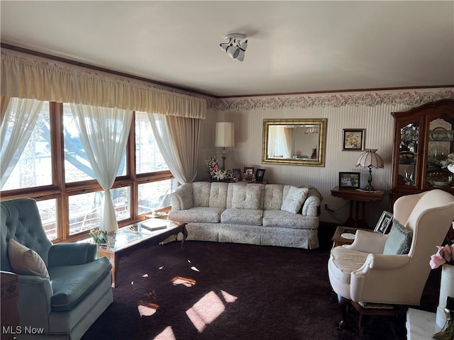 carpeted living room featuring crown molding