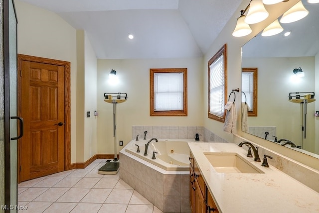 bathroom with a relaxing tiled tub, lofted ceiling, tile patterned flooring, and vanity