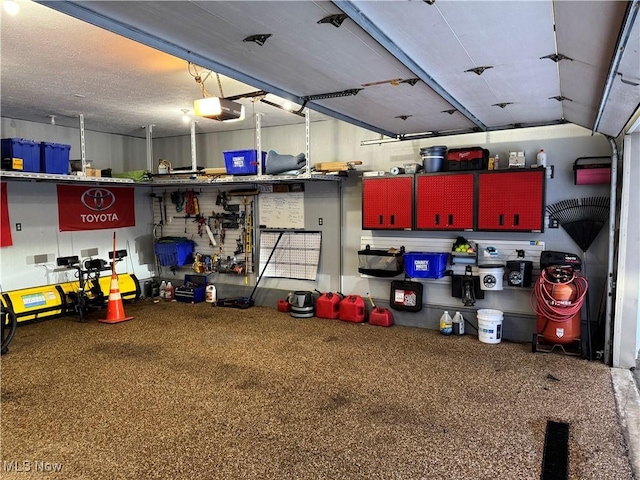 garage featuring a garage door opener