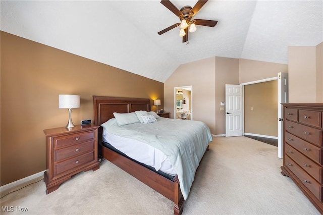 bedroom with lofted ceiling, light carpet, and ceiling fan