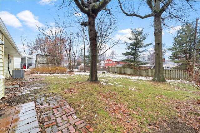 view of yard with central AC unit