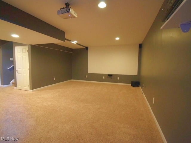 home theater featuring light carpet