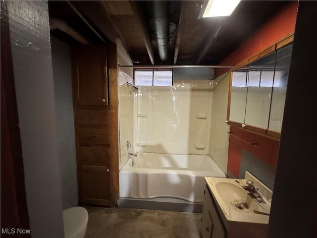 full bathroom featuring vanity, toilet, concrete floors, and shower / bathing tub combination