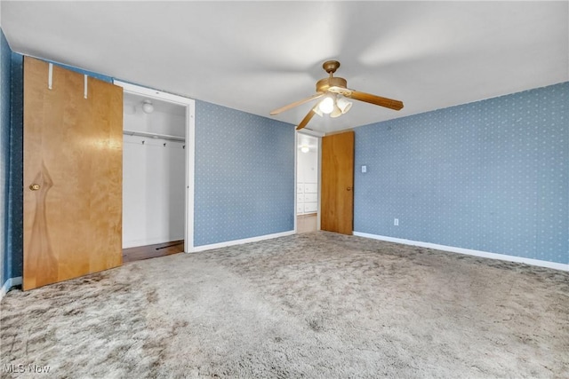 unfurnished bedroom with a closet, ceiling fan, and carpet