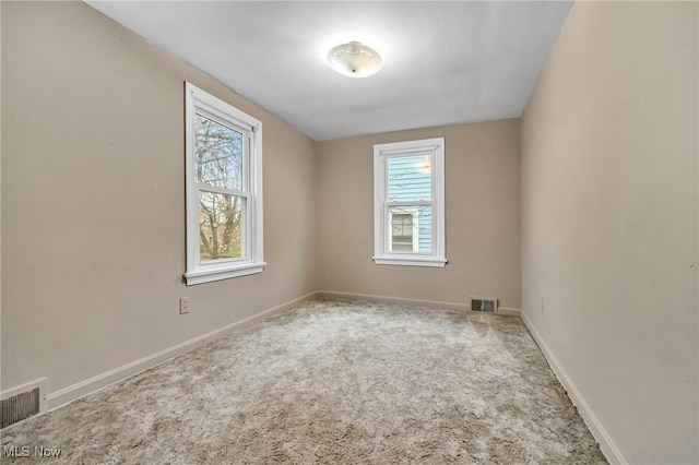 view of carpeted spare room