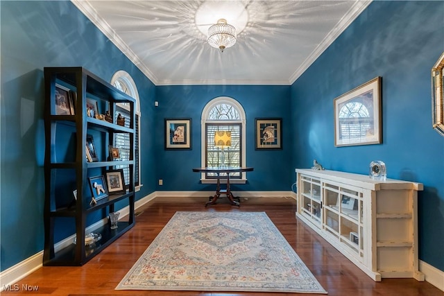 interior space with ornamental molding and dark hardwood / wood-style flooring