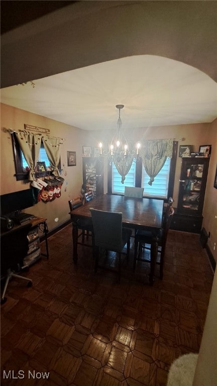 dining room with a chandelier