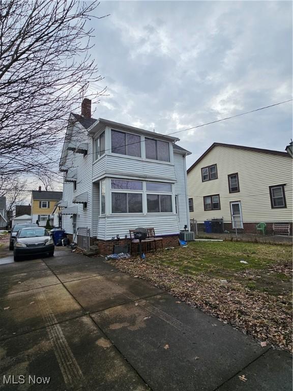 view of home's exterior featuring central AC unit