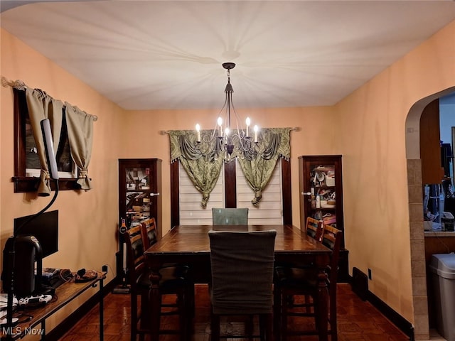 dining area with a chandelier