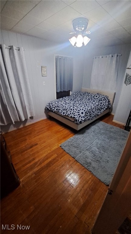 bedroom featuring wood-type flooring