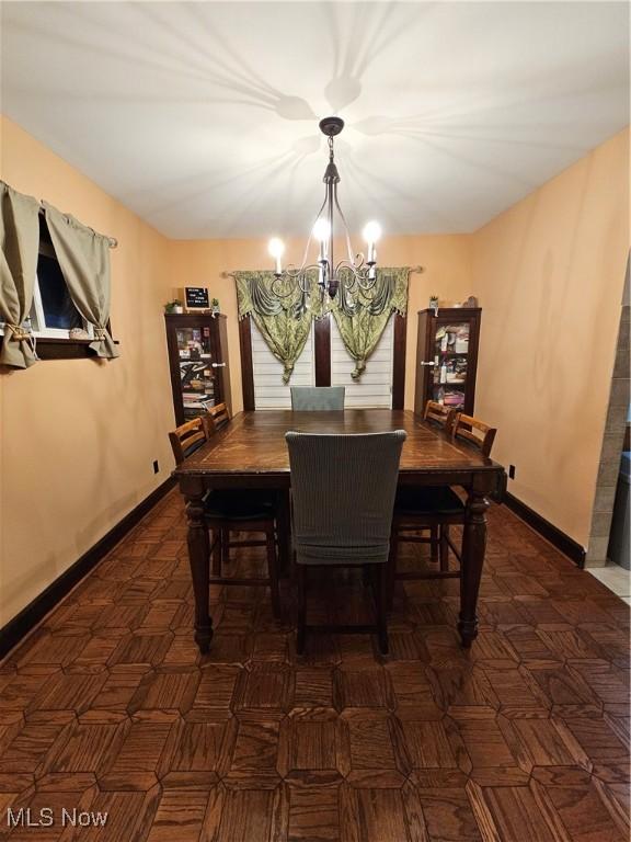 dining room with a chandelier